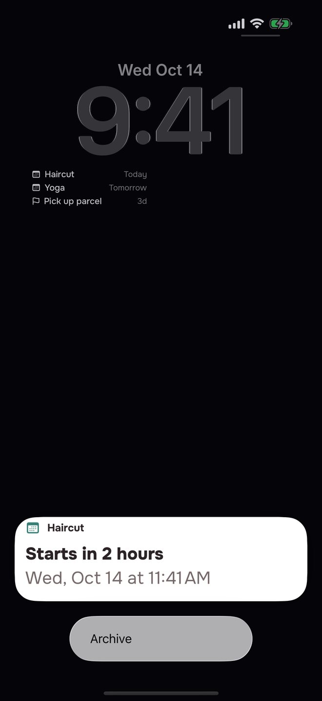 Aheado reminder on the iPhone Lock Screen: Dentist, Starts in 2 hours, held open with Archive
